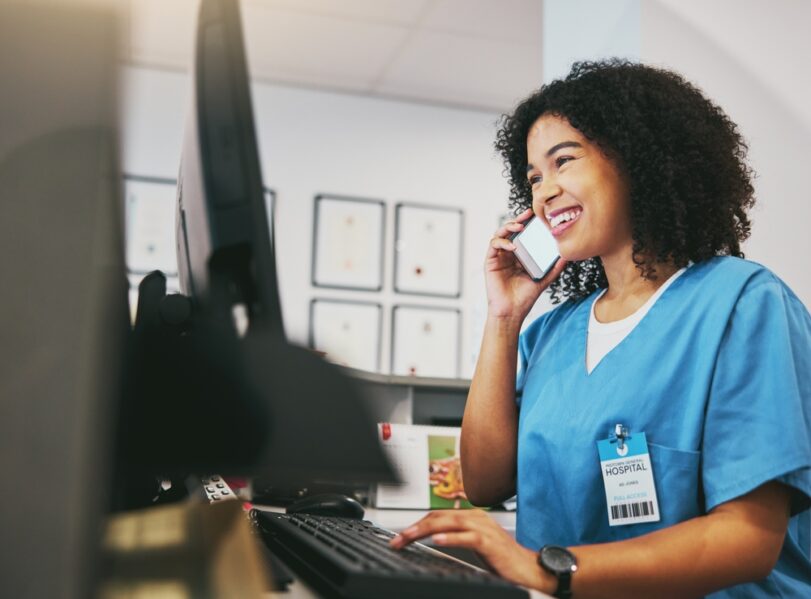 Clinical care coordinator reviewing remote patient monitoring trends to support consistent chronic disease management.